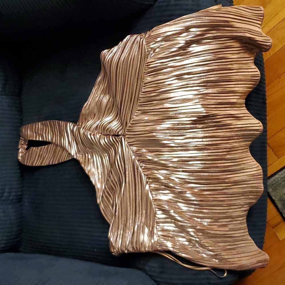 Beautiful, shiny halter top, NWT. Size  L. Made by Monte, sold by Anthropologie.